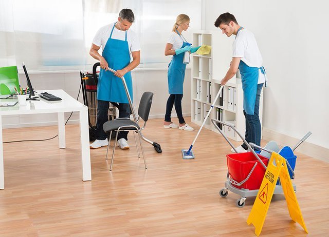 Group-of-workers-cleaning-office-800x577